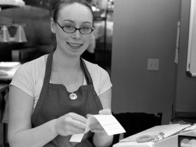 Lady taking our order at Herfy s burgers.jpg